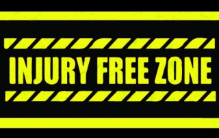sign saying "injury free zone"