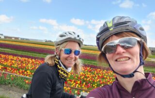 Cycling past tulip fields
