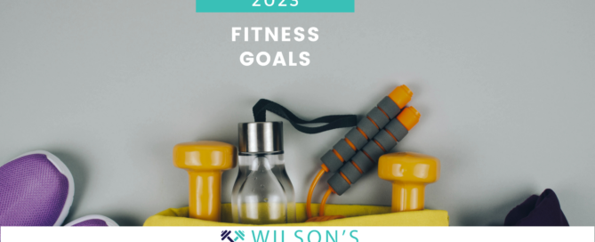 Fitness goals text with fitness equipment